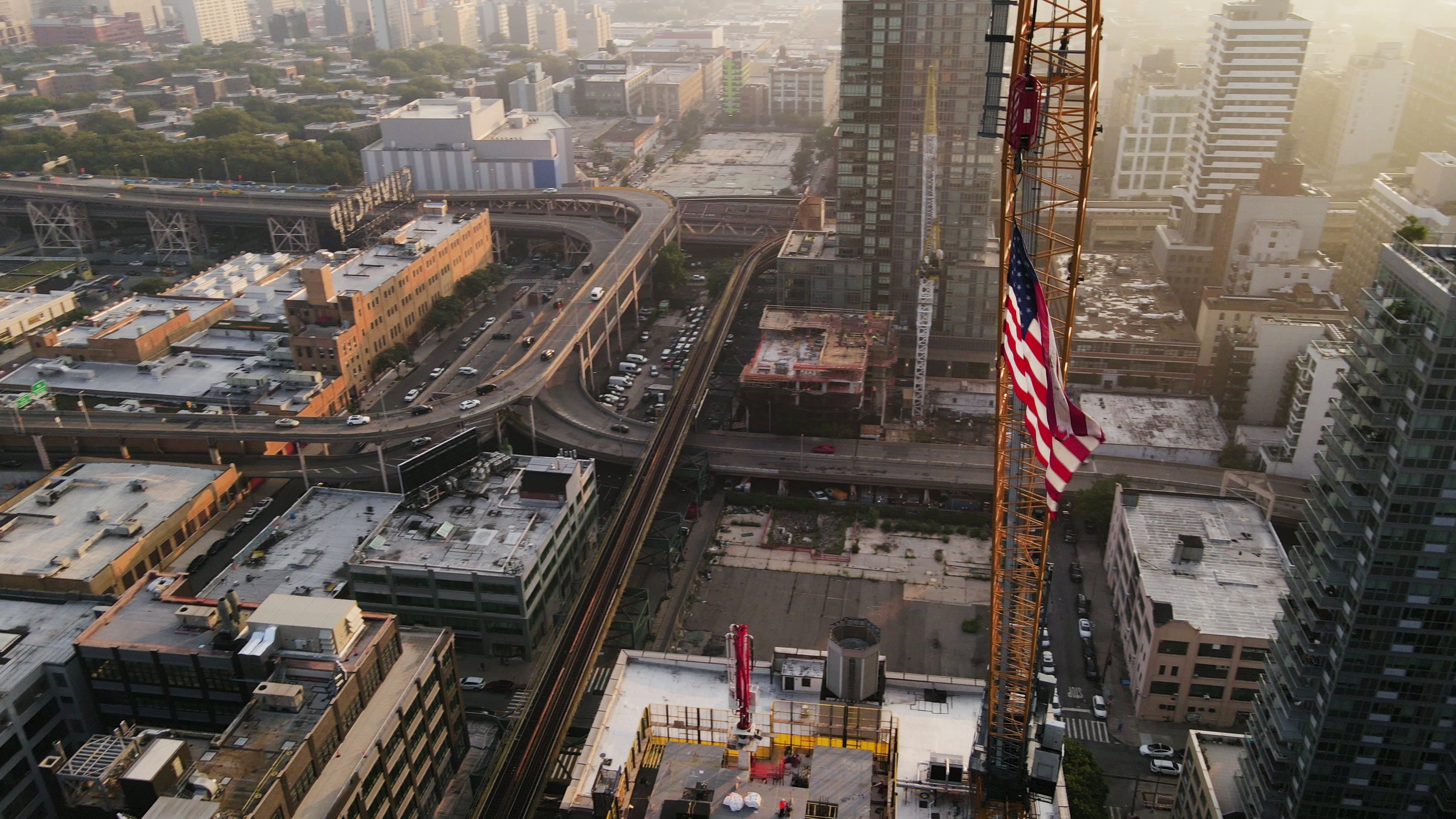 American flag above a construction jobsite